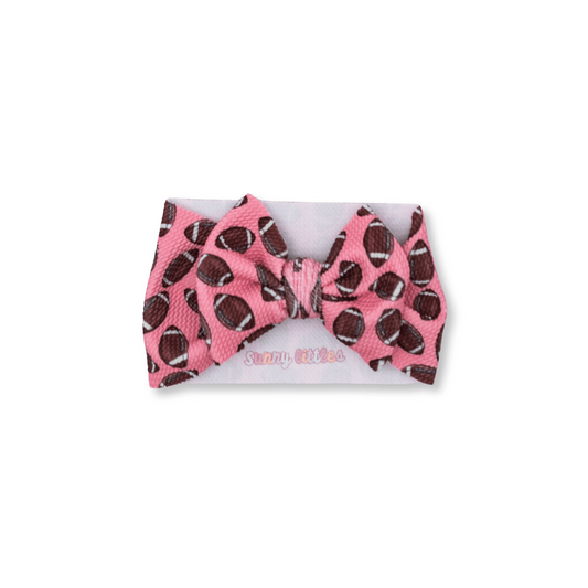 Baby Head Wrap | Handmade Bow | Large Bow | Sizes 0-12m+ | Bullet Polyester | Pink Footballs | hwb3